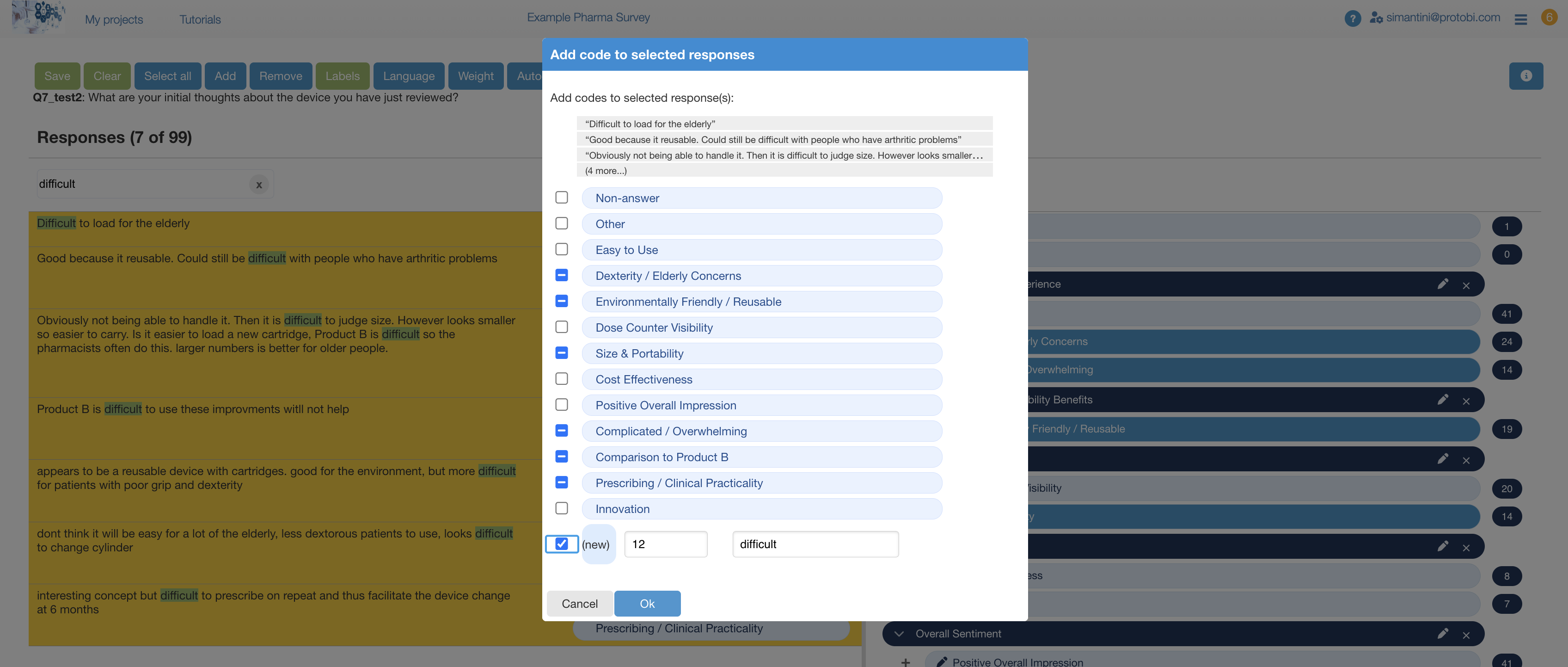 Modal dialog titled 'Add code to selected responses' displaying a list of existing codes with checkboxes (#COST EFFECTIVE, #DOSE INDICATOR, #EASY TO USE, #ECO-FRIENDLY, #GOOD, #NOT EASY, #OTHER, #SIMILAR) and a '(new)' option with '9' in a field and 'difficult' entered as the new code name. The dialog shows the filtered responses will receive this code and includes Cancel and Ok buttons